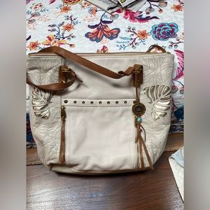 White with gold design SAK bag.  Excellent condition!!